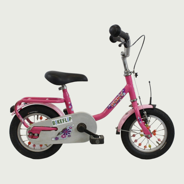 12.134 - BikeFlip, 12 inch kinderfiets, Puky fiets, roze kinderfiets, spaak kraaltjes, terugtraprem, handrem, kabelslot