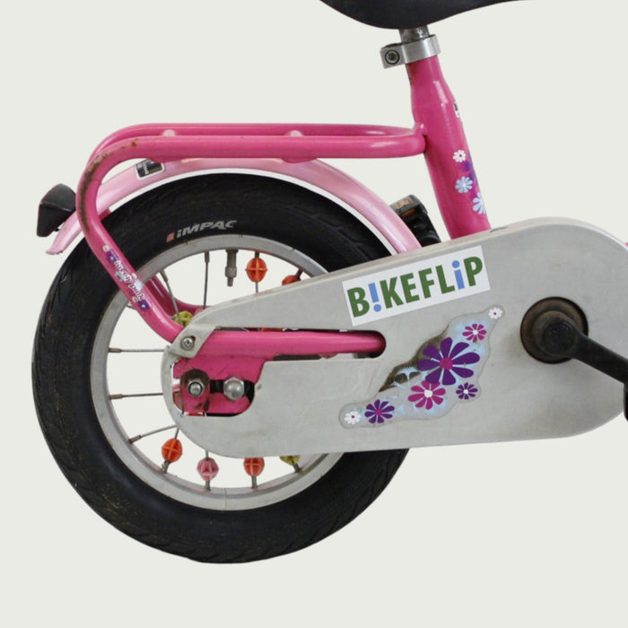 12.134 - BikeFlip, 12 inch kinderfiets, Puky fiets, roze kinderfiets, spaak kraaltjes, terugtraprem, handrem, kabelslot