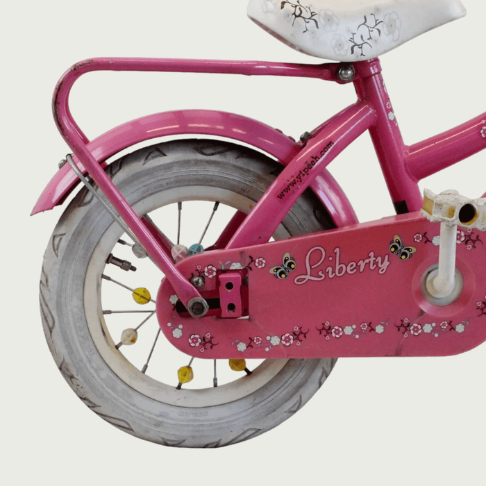 12.146 - BikeFlip, 12 inch kinderfiets, roze kinderfiets, kinderfiets met voorrekje, zijwieltjes, terugtraprem, handrem